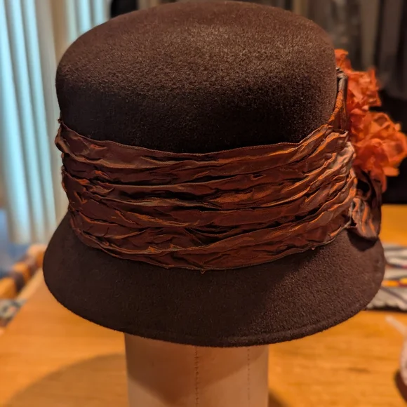 Elegant Brown Hat with Floral Accent